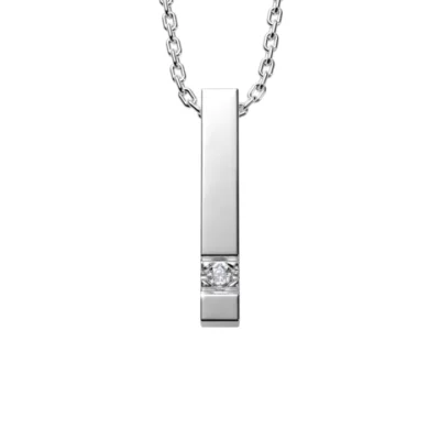 Close-up of the silver, rectangular pendant of this necklace. white background.